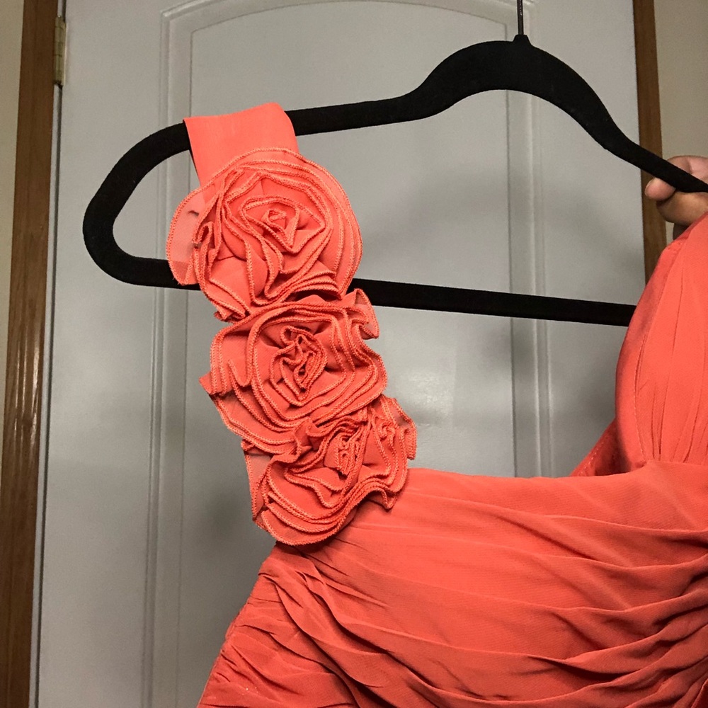 One shoulder. Salmon. Tule. Floral embellishment.
